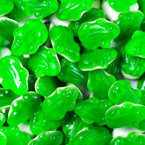 A pile of green Haribo Quaxi Gummies by Exotic Snacks, shaped like frogs with a glossy finish and soft white marshmallow undersides.