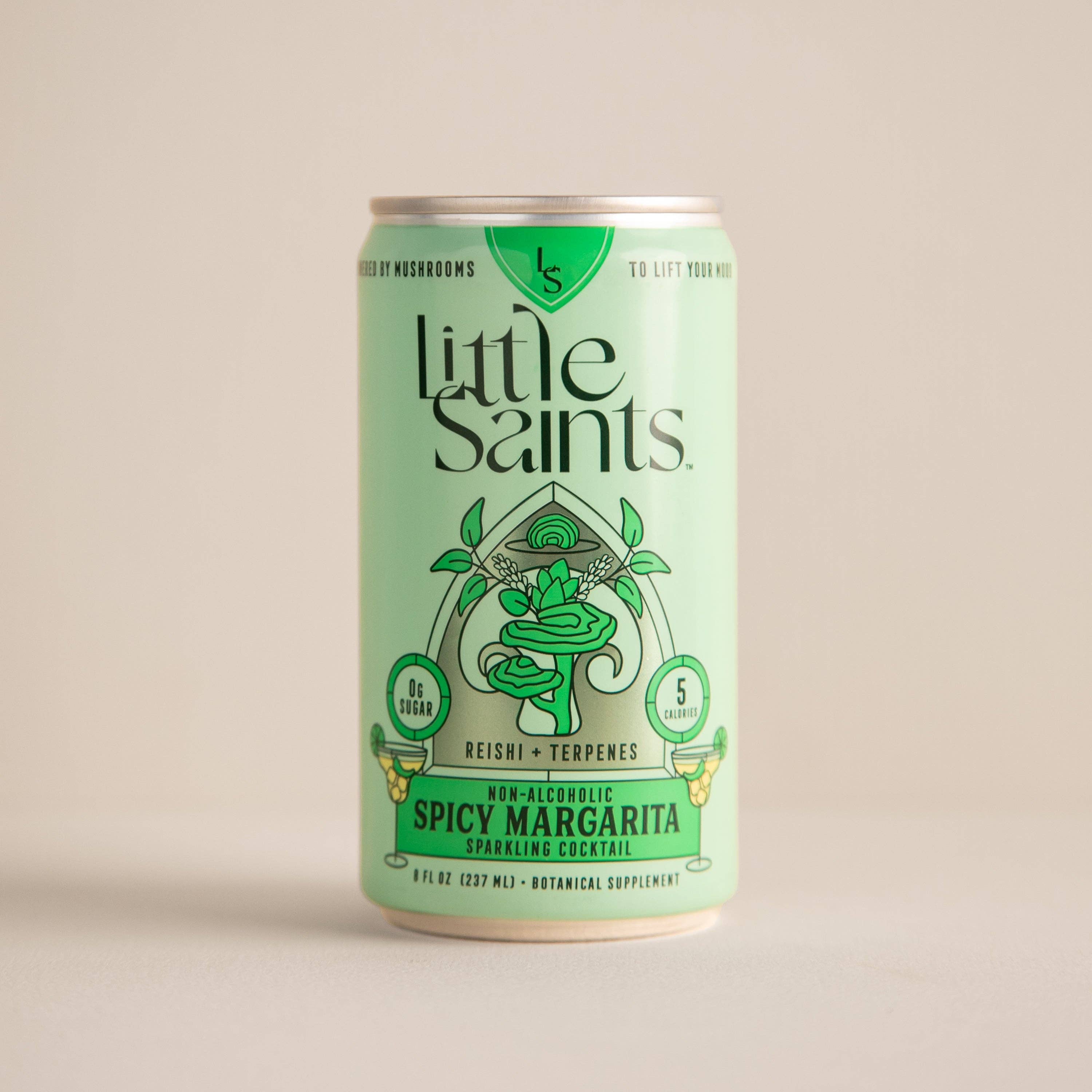 A green can of Little Saints Spicy Margarita Adaptogenic Mocktail, a non-alcoholic sparkling drink with reishi mushroom and terpenes, featuring label art of lion’s mane mushroom, a cocktail glass, and lime wedges.