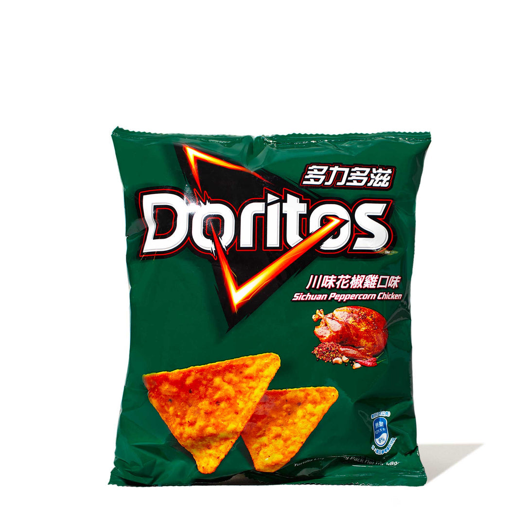 A green bag of Exotic Snacks Doritos-Sichuan Chicken shows two spicy chips and peppered chicken on the front, with packaging in both Chinese and English.