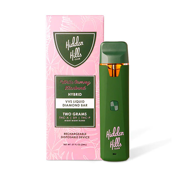 A green Hidden Hills Liquid Diamonds Disposable vape pen sits next to its pink and green box, labeled White Gummy Kushmint Hybrid with Delta 8, Two Grams.