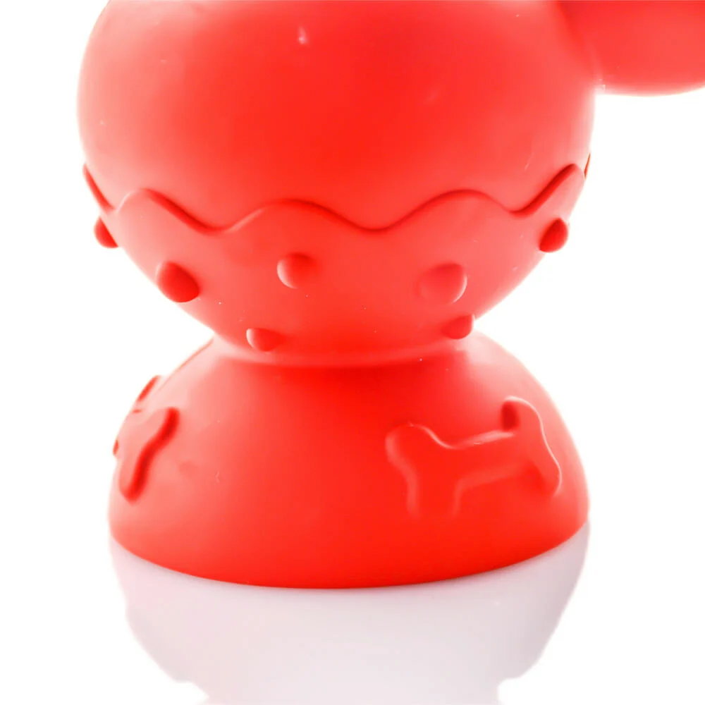 Close-up of Puff Palzs The Tug & Toke, a red natural rubber dog toy with bone and dot patterns, displayed against a white background.