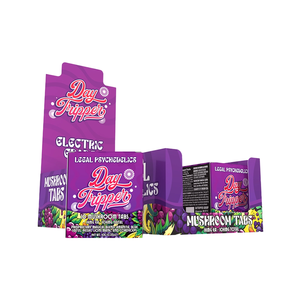 Three colorful boxes labeled Day Tripper Mushroom Tabs by Day Tripper, with vibrant purple psychedelic patterns and text reading Electric and 10 Psychedelic Tabs, are featured as legal mood-elevating mushroom products on a white background.
