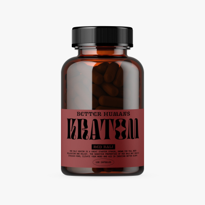 A brown pill bottle labeled Bad Days Red Bali Kratom Capsules with a red label and black screw cap. Small text on the label provides product details. The bottle contains dark capsules for stress relief and full body relaxation.