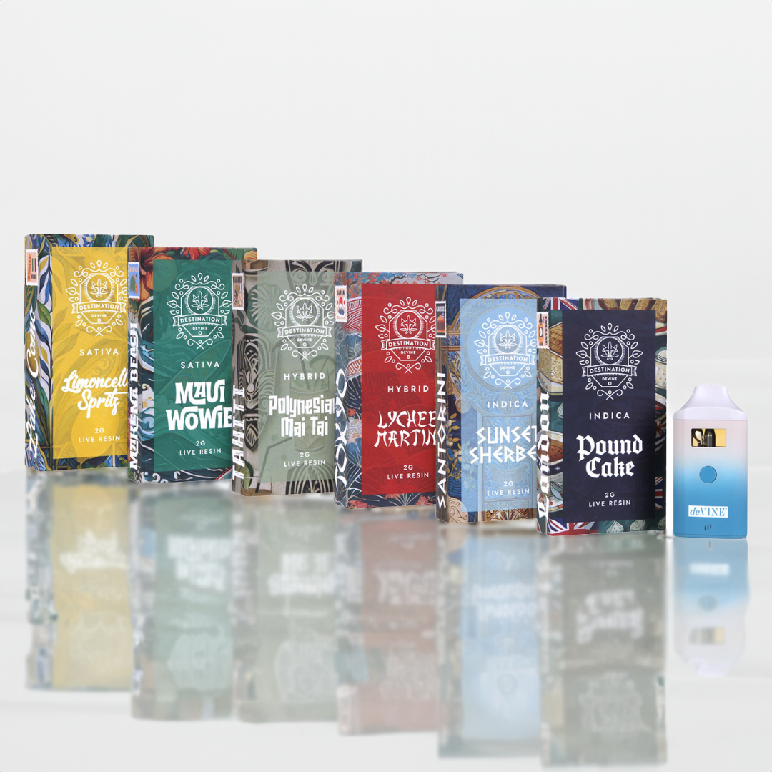 Seven colorful premium DeVINE Wellness vape cartridge boxes, each with a unique strain and design, are displayed beside a sleek white and blue deVINE Destinations Live Resin THC Disposable on a reflective background that highlights their vibrant, travel-inspired appeal.