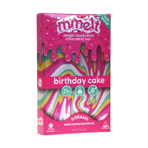 A vibrant box labeled Mmelt Mushroom Chocolate Bar by Cali Extrax features playful pink icing, psychedelic swirls, and icons showing 6 grams, 21+, and edible mushroom chocolate content.