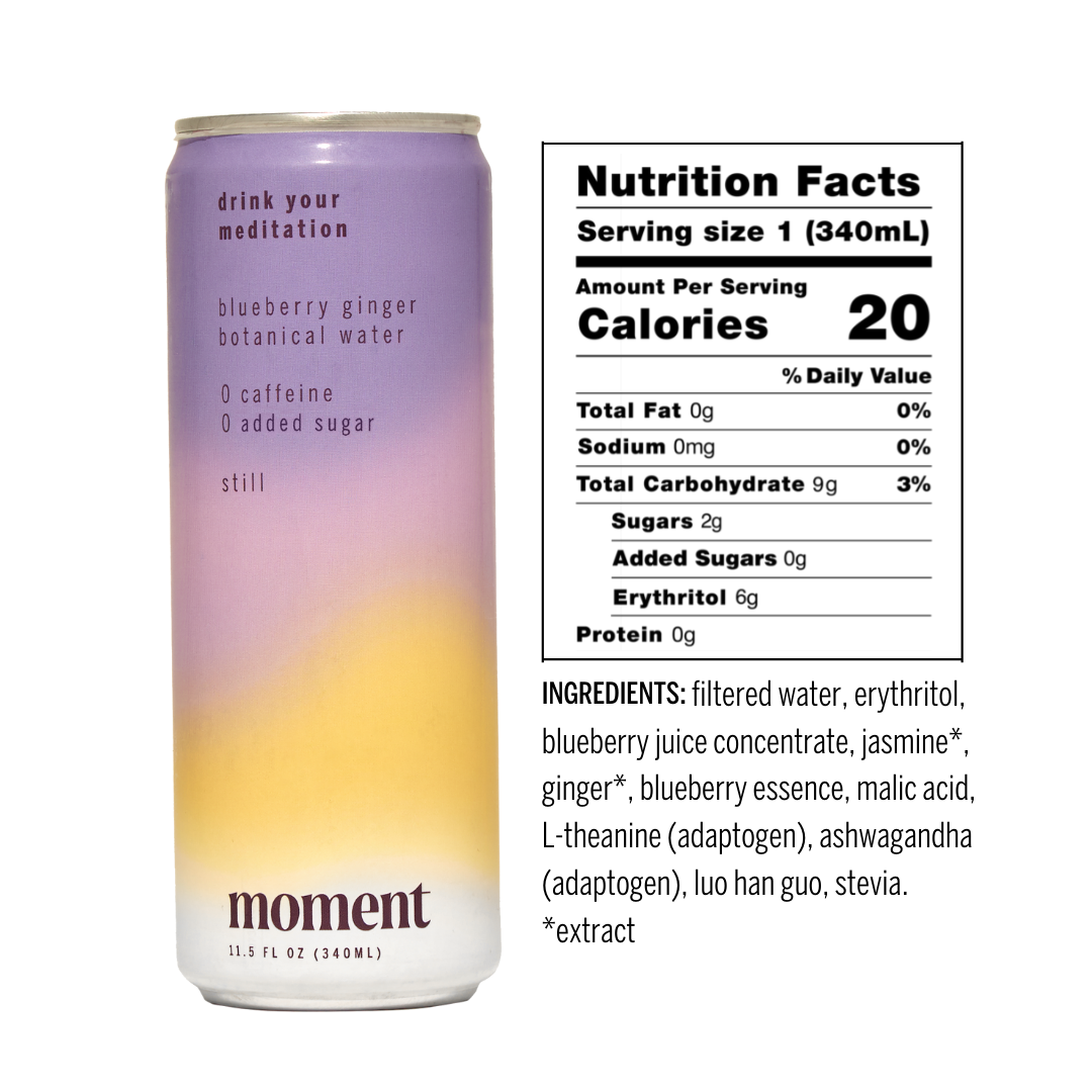 A can of Moment Botanical Beverage by Moment, blueberry ginger flavor, is pictured next to its nutrition label. The purple and yellow can says “0 caffeine, 0 added sugar.” Ingredients and facts are in black on a white background. Meditation in a can.