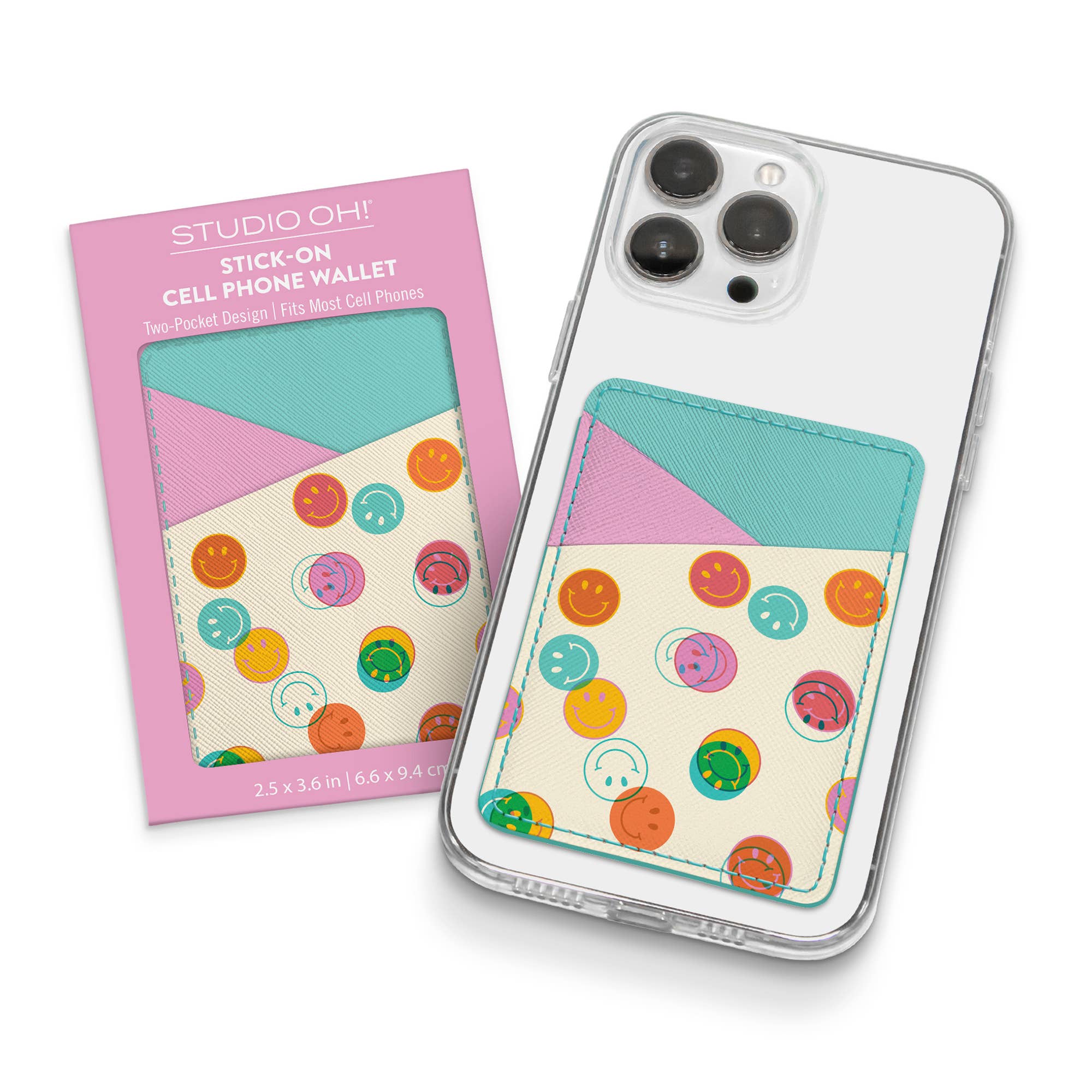The Studio Oh! Smiley Trails Stick-On Cell Phone Wallet, featuring smiling and winking faces, attaches to the back of a clear case. Its packaging displays the same playful design and reads Studio Oh! adhesive phone card holder.