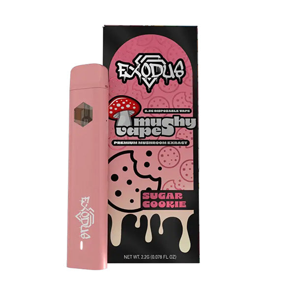 A pink disposable Mushy Vape pen by Exodus is next to its box, decorated with mushroom art and text that says mushy vape, premium mushroom extract, and sugar cookie.