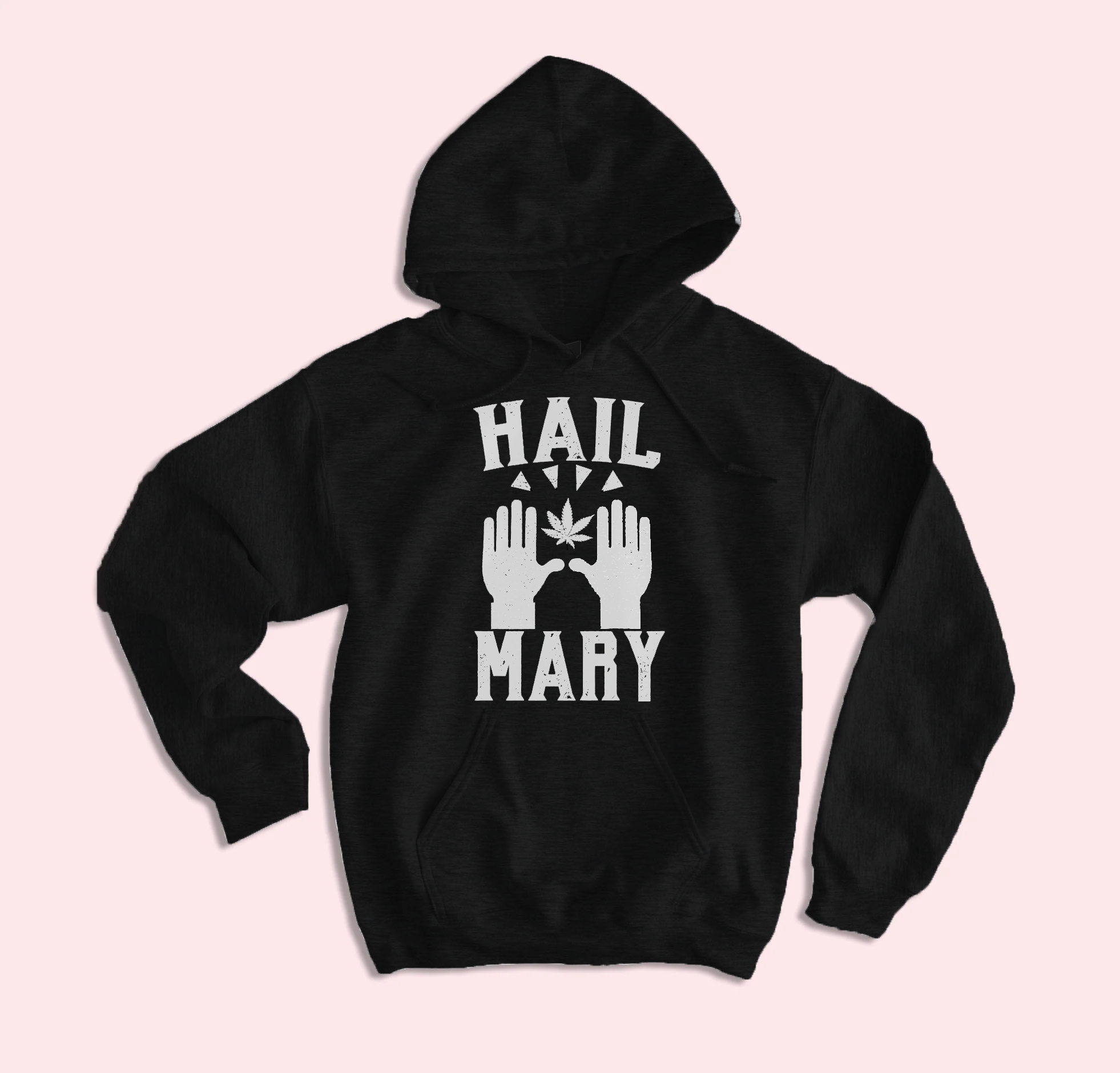 Embrace the 420 lifestyle with the HiCiti Hail Mary Hoodie, showcasing bold white lettering and raised hands holding a marijuana leaf on light pink. The ideal cannabis hoodie to make a statement.