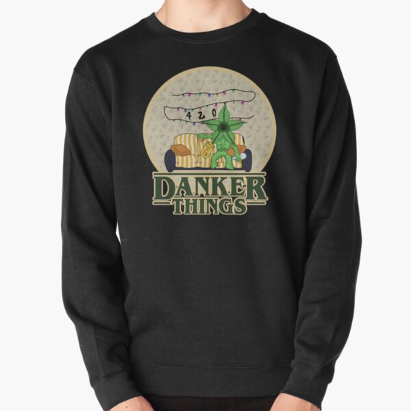 Someone wears the HiCiti Danker Things Crewneck Sweatshirt, featuring a cartoon marijuana leaf and Danker Things text—a playful twist on 80s nostalgia, perfect for fans of Stranger Things and unique streetwear.