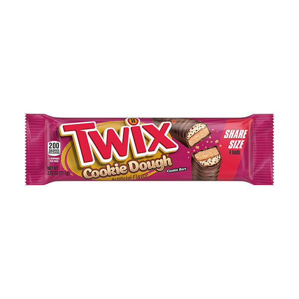 A Twix - Cookie Dough bar by Exotic Snacks in a red Share Size wrapper, showing layers of milk chocolate, caramel, cookie, and rich cookie dough filling.