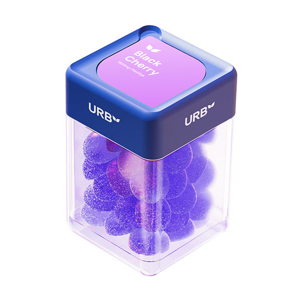 A clear, rectangular container with a blue lid labeled Sky Bites THC Gummies and URB, filled with purple, sugar-coated gummies.