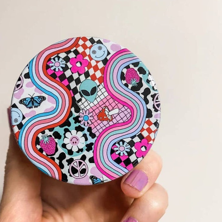 90's Vibes Herb Grinder with colorful 90s inspired design, magnetized lid, and heavy duty zinc alloy construction.