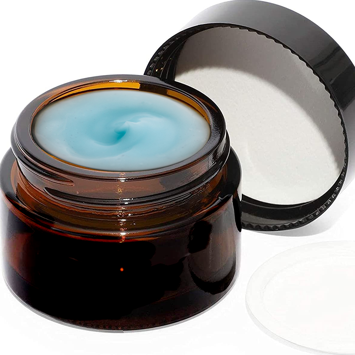 An amber glass jar of deVINE Cooling Muscle Gel by DeVINE Wellness sits open with its black lid and white seal beside it, revealing the light blue gel inside that suggests soothing pain relief.